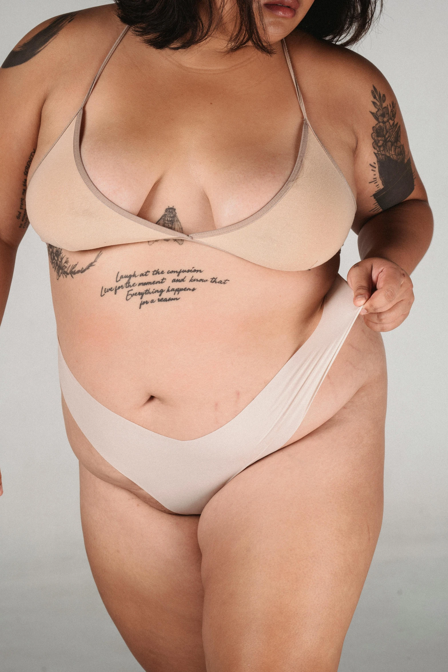 a woman in a bikini posing for a picture, an album cover, by Matija Jama, reddit, clear curvy details, silicone skin, covered with organic flesh, on clear background