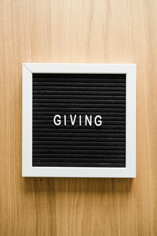 a letter board with the word giving written on it, thumbnail, pixvy, foundation, living