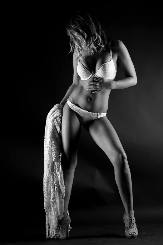 a black and white photo of a woman in lingerie, a black and white photo, by Tom Bonson, white sarong, fit curvy physique, various posed, detailed high contrast lighting