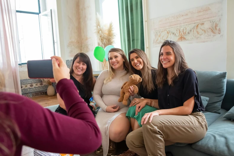 a group of women sitting on top of a couch, a picture, pexels contest winner, figuration libre, pregnant, taking a selfie, avatar image