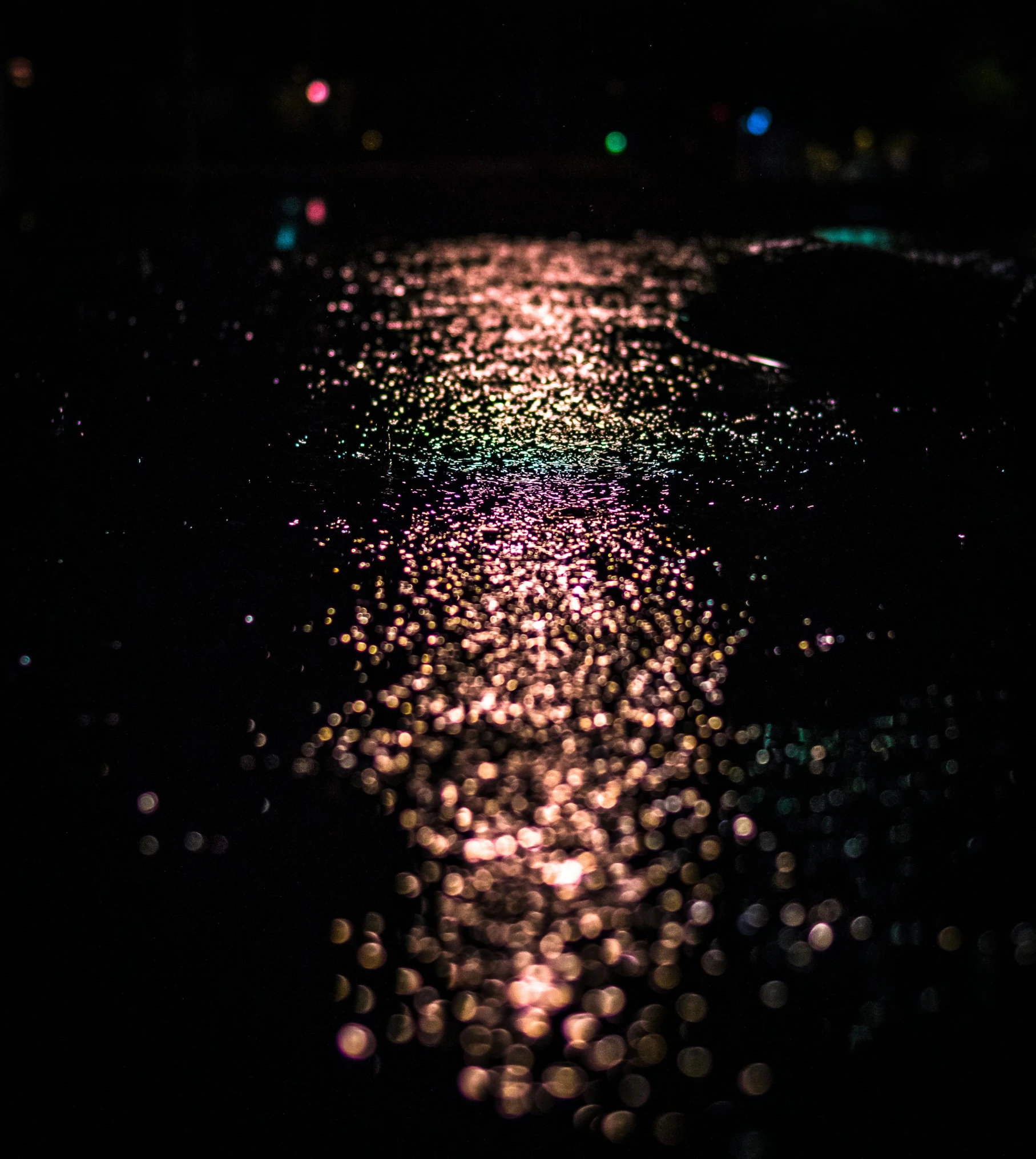 the reflection of a street light in a puddle of water, an album cover, inspired by Elsa Bleda, unsplash, glitter gif, 8k 50mm iso 10, dark road, ( ( ( colorful ) ) )