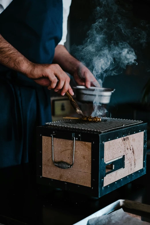 a close up of a person cooking food on a stove, hive, inside its box, detailed bushido form smoke, bespoke