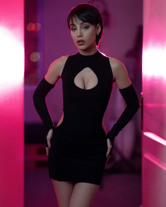 a woman in a black dress posing for a picture, an album cover, by Anthony Devas, trending on pexels, hurufiyya, better known as amouranth, soft neon atmosphere, cut out, 5 0 0 px models