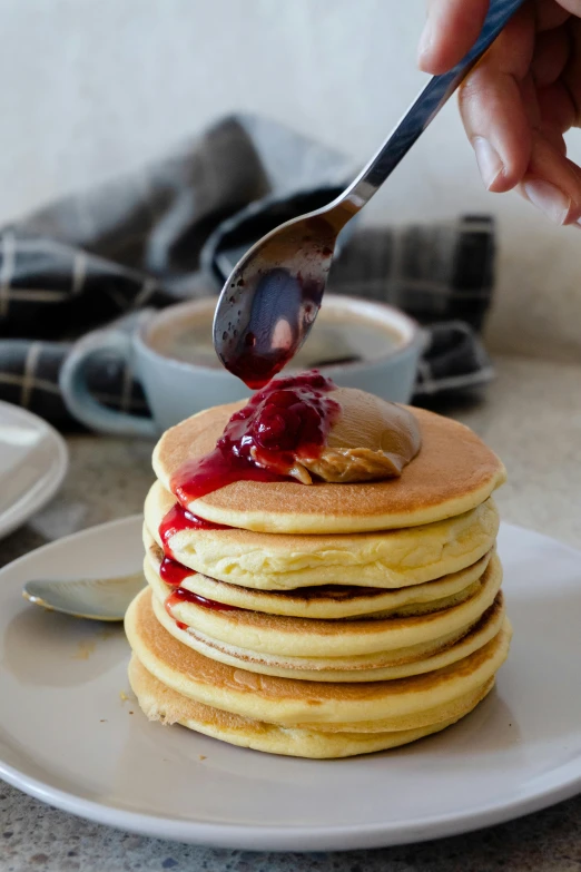 a stack of pancakes sitting on top of a white plate, inspired by Richmond Barthé, unsplash, japanese collection product, spatula, jelly, in australia