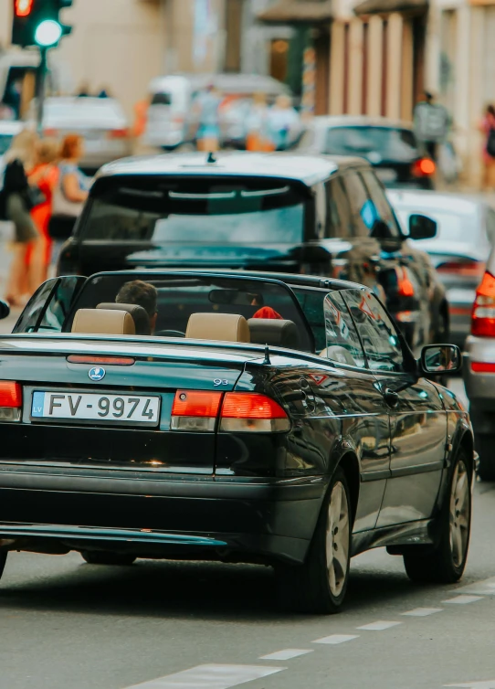 a large number of cars traveling down the street