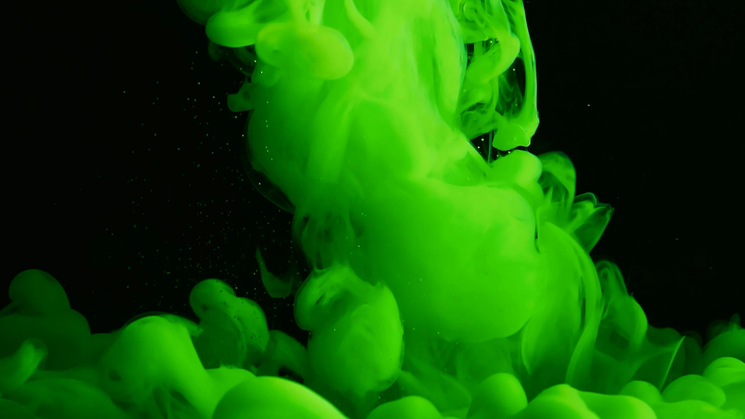 a close up of a green substance in water, inspired by Hu Zao, pexels, splashes of neon clouds, avatar image, ink, slimer