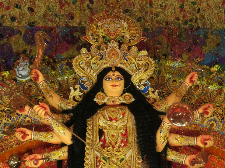 a close up of a statue of a woman, an album cover, pexels, bengal school of art, a massive celestial giant god, festivals, dressed in ornate, satanic