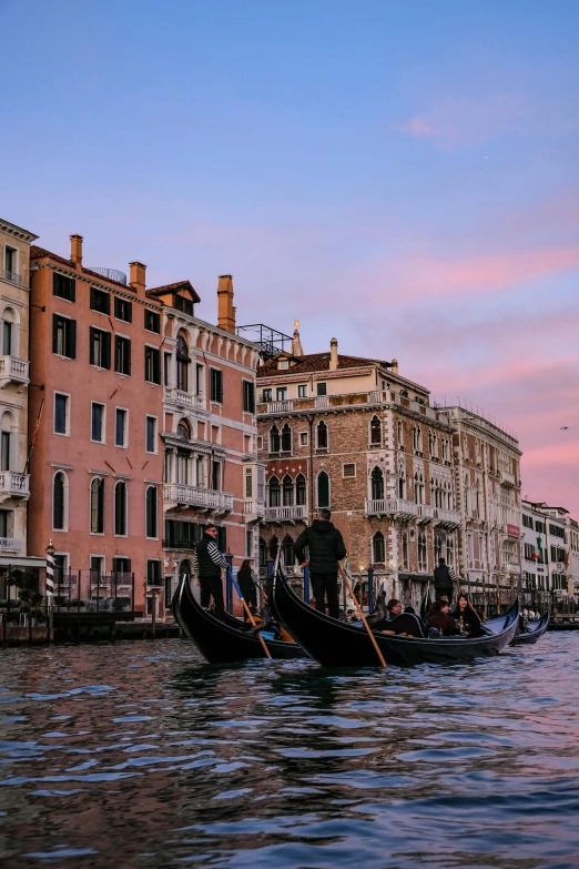 a couple of gondolas that are in the water, inspired by Gentile Bellini, pexels contest winner, renaissance, at dusk!, slide show, pink marble building, caught in 4 k