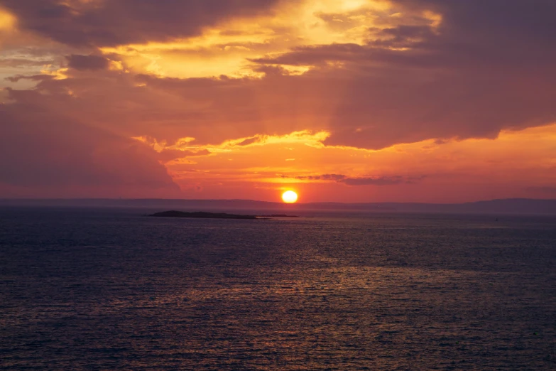 the sun is setting over a body of water, pexels contest winner, romanticism, orkney islands, fan favorite, over the horizon, high quality photo