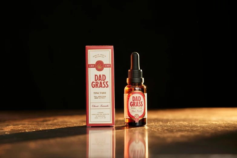 a bottle of beard oil next to a box of beard oil, dada, patches of red grass, true proportions, dad energy, portrait image