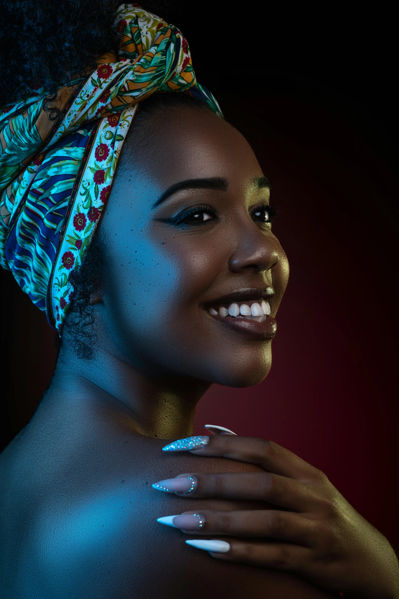 a woman in a turban smiles at the camera, an album cover, inspired by Makoto Aida, pexels contest winner, afrofuturism, studio lighting”, turqouise, color photograph portrait 4k, ( ( dark skin ) )