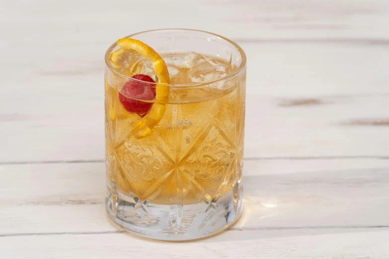 a close up of a drink in a glass on a table, square, classic gem, light tan, thumbnail