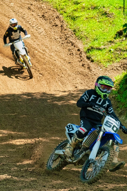 a dirt bike rider in the middle of a race