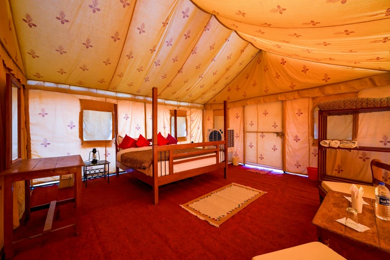 a bed room with a neatly made bed and red carpet, hurufiyya, merchant tents, inside a grand, red ocher, sky view