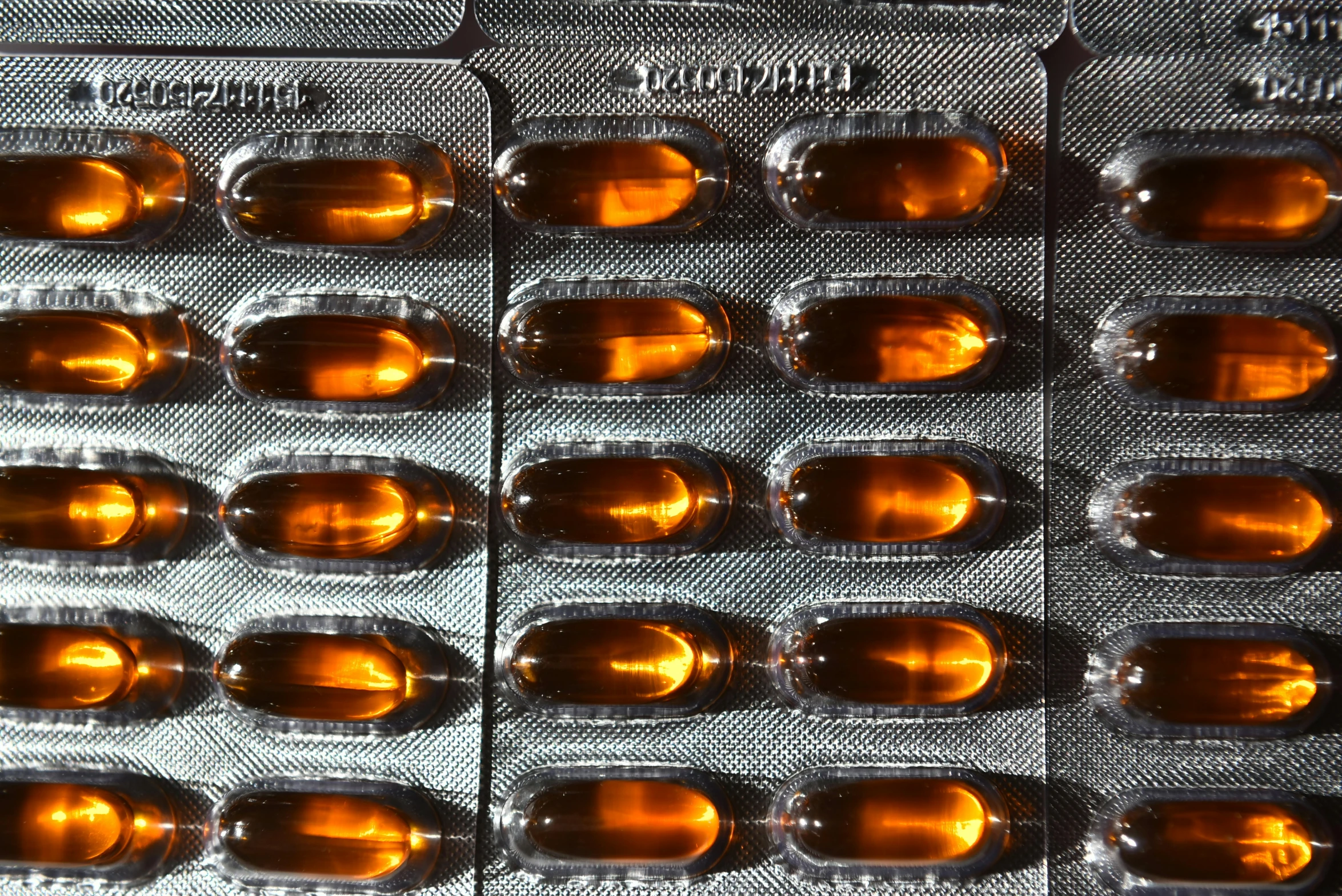 vitamins in an i - pill case arranged neatly