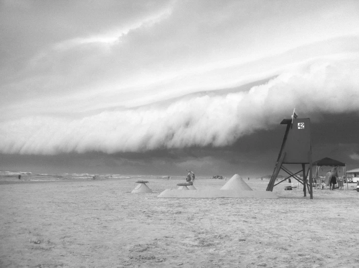 a group of people standing on top of a sandy beach, a black and white photo, inspired by Max Dupain, surrealism, hurricane stromy clouds, medium poly, detail, bunkers