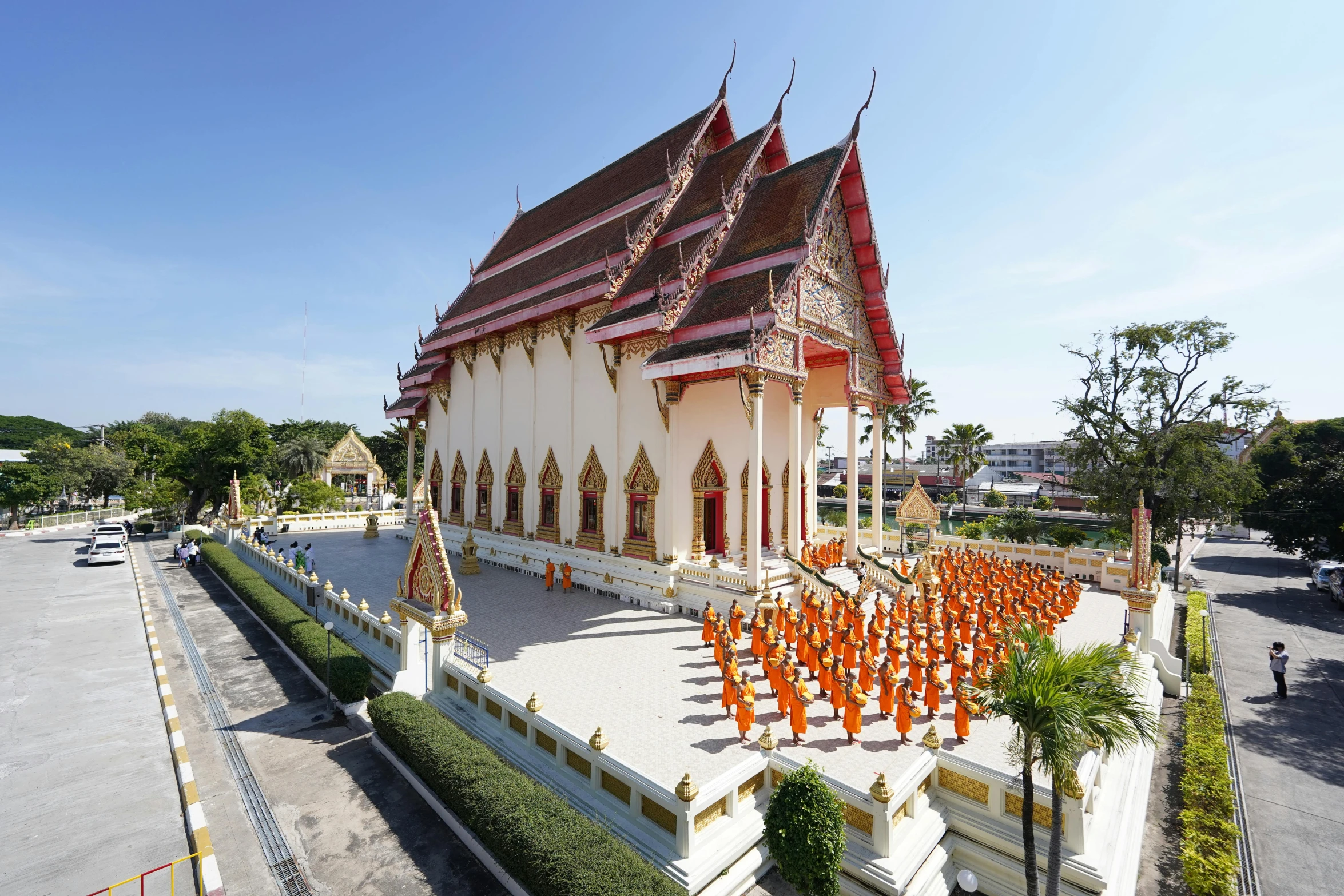 a building is full of orange flags and decorations