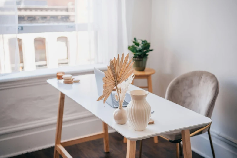 two vases are placed on the table