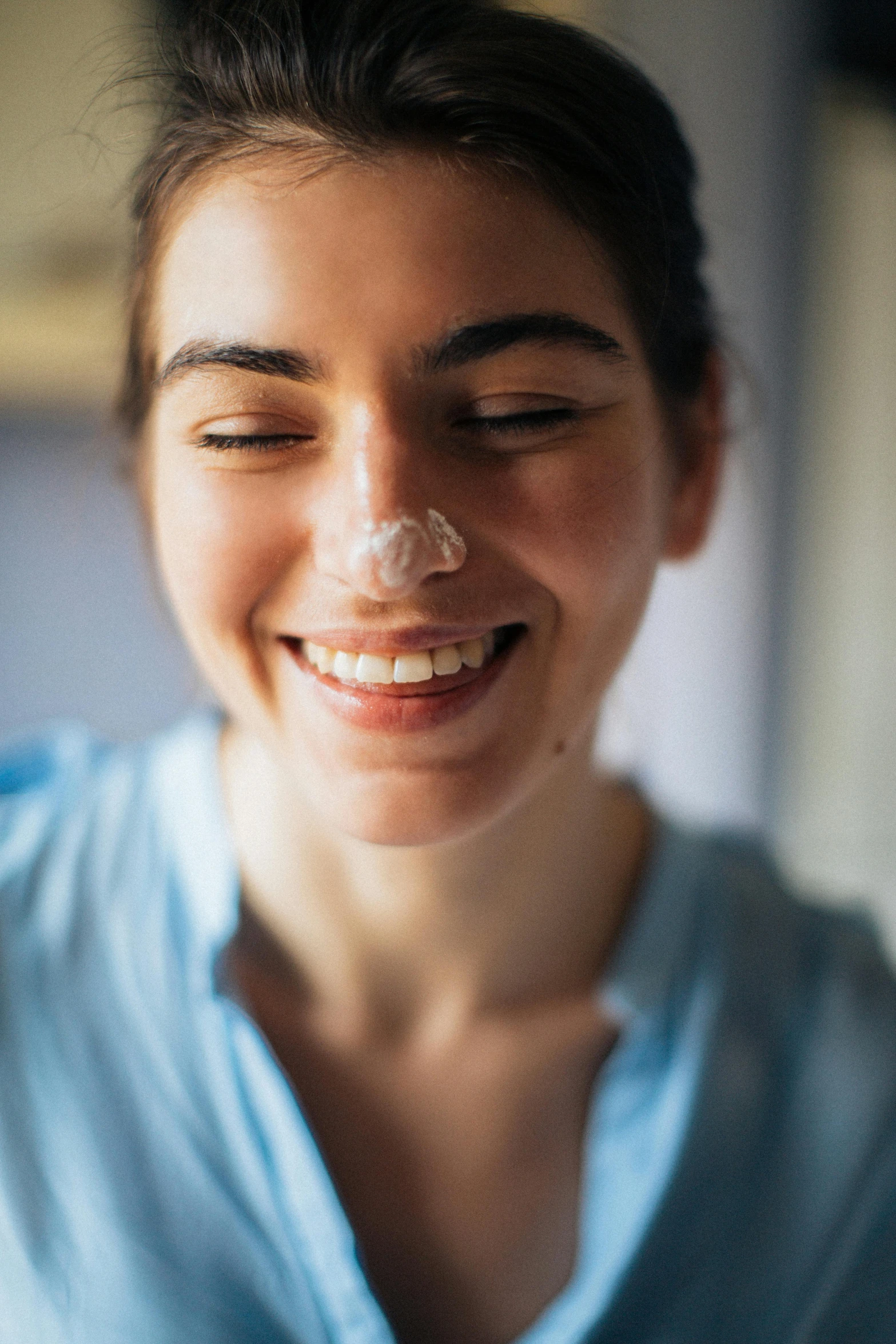 a woman with a piece of cake in her mouth, by Daniel Lieske, trending on unsplash, renaissance, nasal strip, light smiling, closeup of sweating forehead, milk