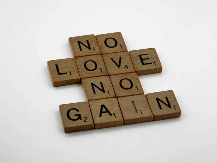 wooden scrabbles spelling no love, no gain, by Gavin Nolan, magnesium, in john salt style, rankin, dramatic”