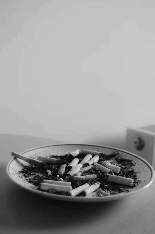 a white plate topped with a pile of cut up fruit