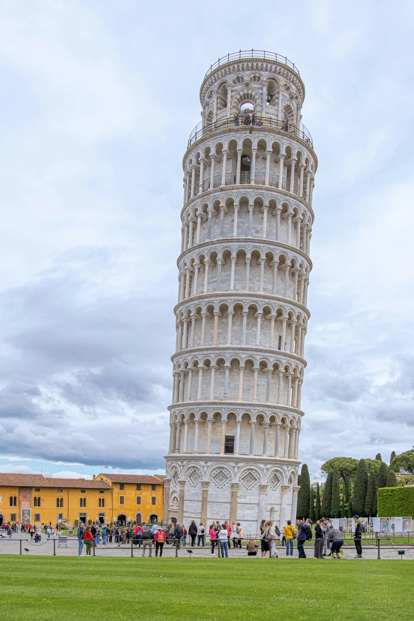 a tall tower sitting on top of a lush green field, by Michaelangelo, exterior, pasta, overview, square