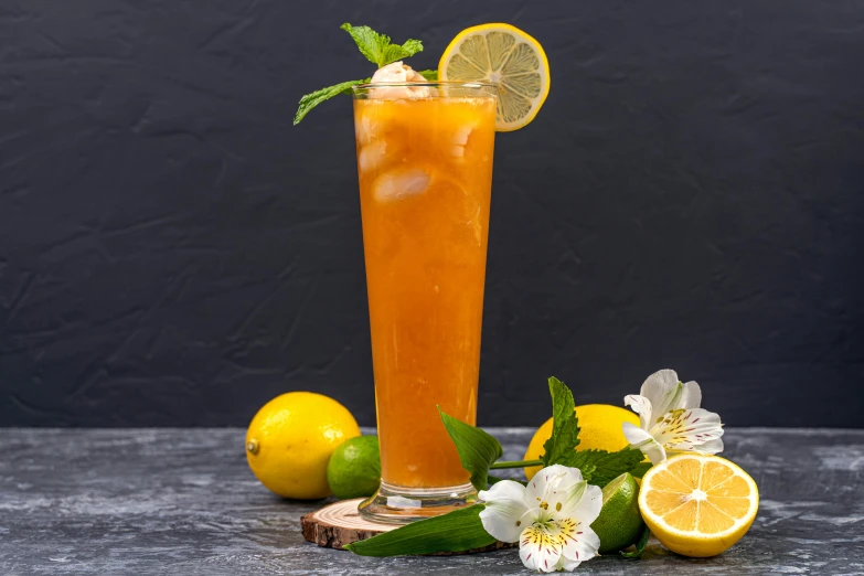 a tall glass filled with orange juice and lemons, by Tuvia Beeri, mint, profile image, background image, hurricane