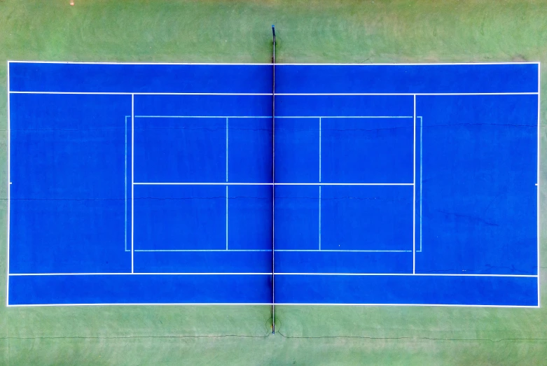 a very close up picture of an empty tennis court