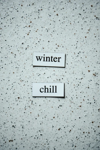 two pieces of paper with the words winter and chill written on them, inspired by Ian Hamilton Finlay, pexels contest winner, concrete poetry, fridge, vinyl, chili