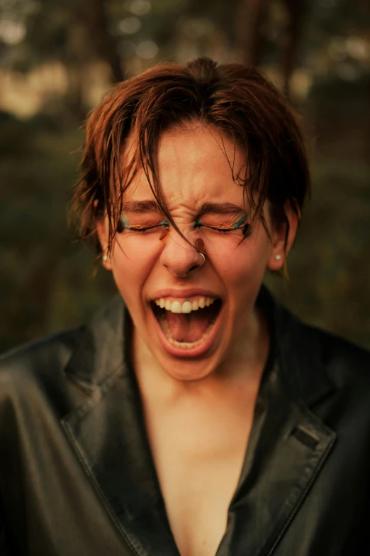 a close up of a person wearing a leather jacket, pexels contest winner, renaissance, screaming and crying, portrait androgynous girl, portrait of ((mischievous)), sydney hanson