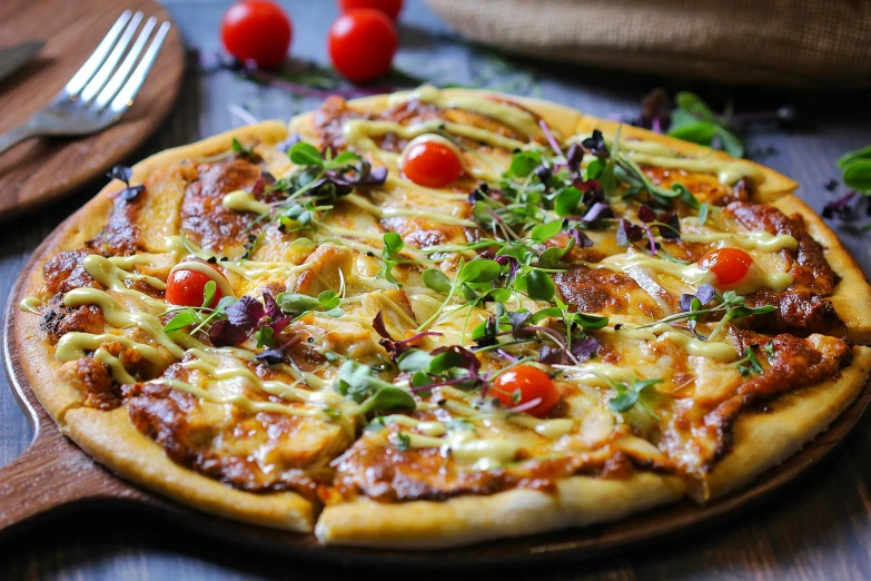 a pizza sitting on top of a wooden cutting board, a portrait, pixabay, flowers around, trending photo, fan favorite, humus