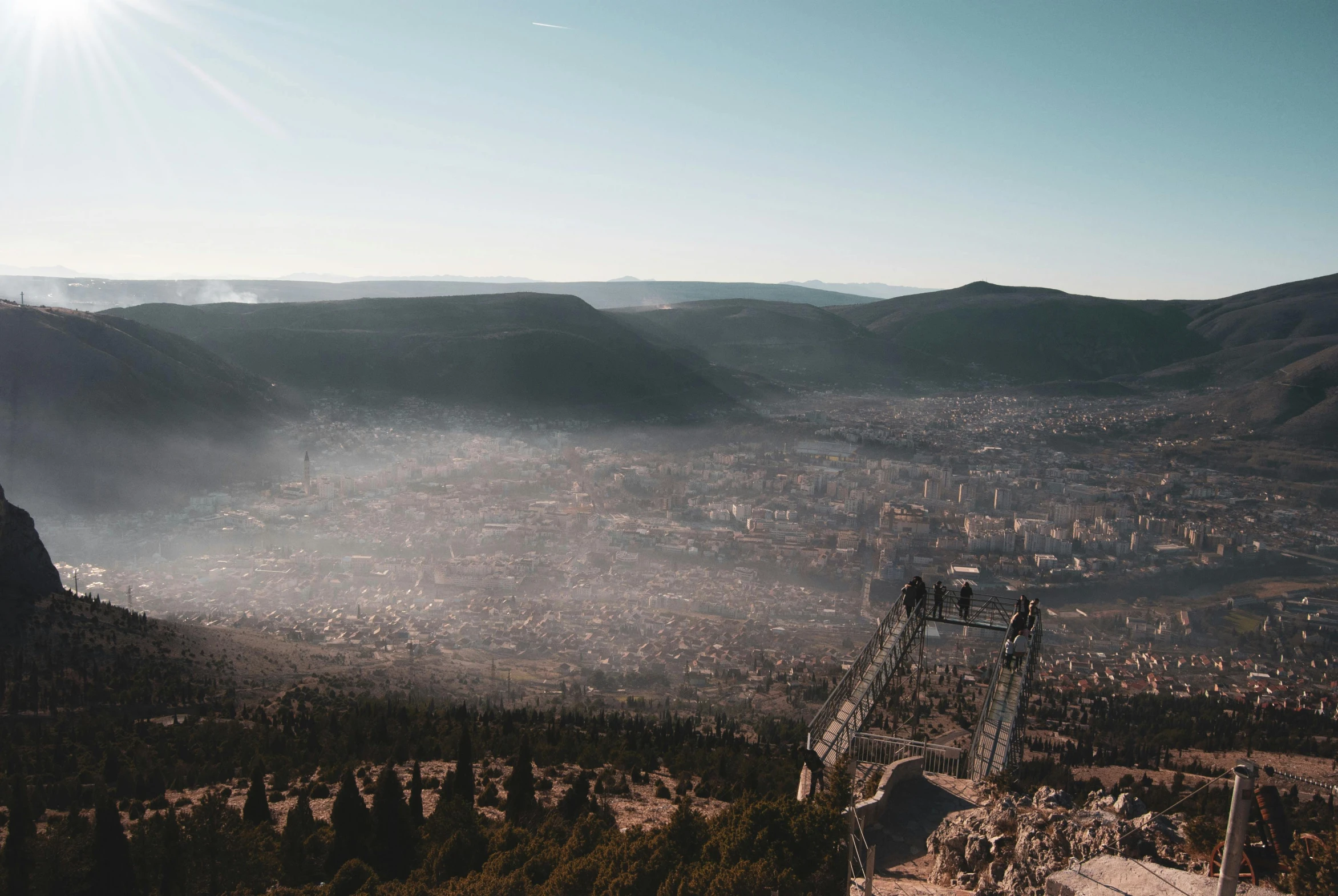 a bird's eye view of the mountains with houses