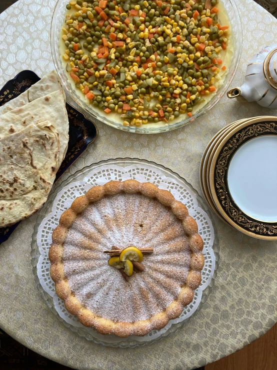 a table topped with plates and bowls of food, inspired by Modest Urgell, dau-al-set, chuvabak, profile image, profile pic