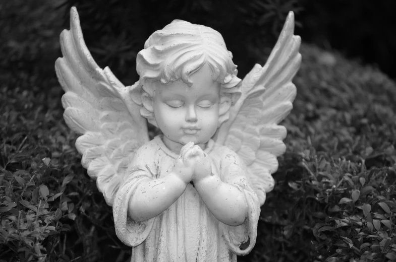 a statue of an angel praying in a garden, pixabay contest winner, icon black and white, little kid, detailed and soft, closed hands