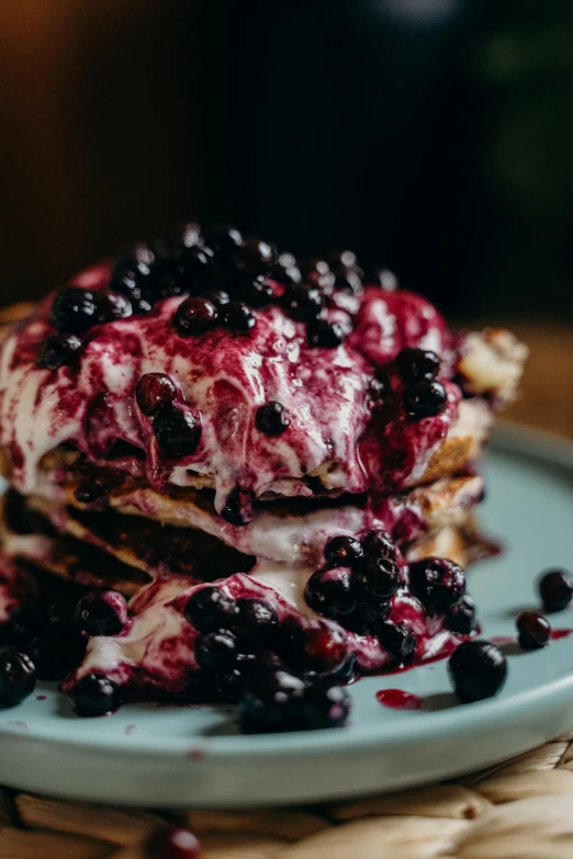 a stack of blueberry waffles with cheese