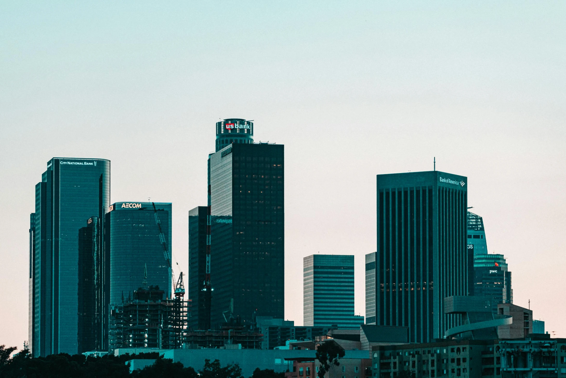 a man flying a kite in front of a city skyline, inspired by L. A. Ring, unsplash contest winner, modernism, tall minimalist skyscrapers, !dream los angeles, hq 4k phone wallpaper, brutalist buildings tower over