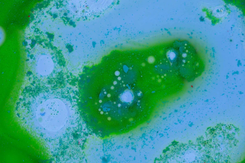 a close up of a green and blue substance, a microscopic photo, inspired by Raoul De Keyser, dreamy painting of coronavirus, bubble bath, bird's view, mdma