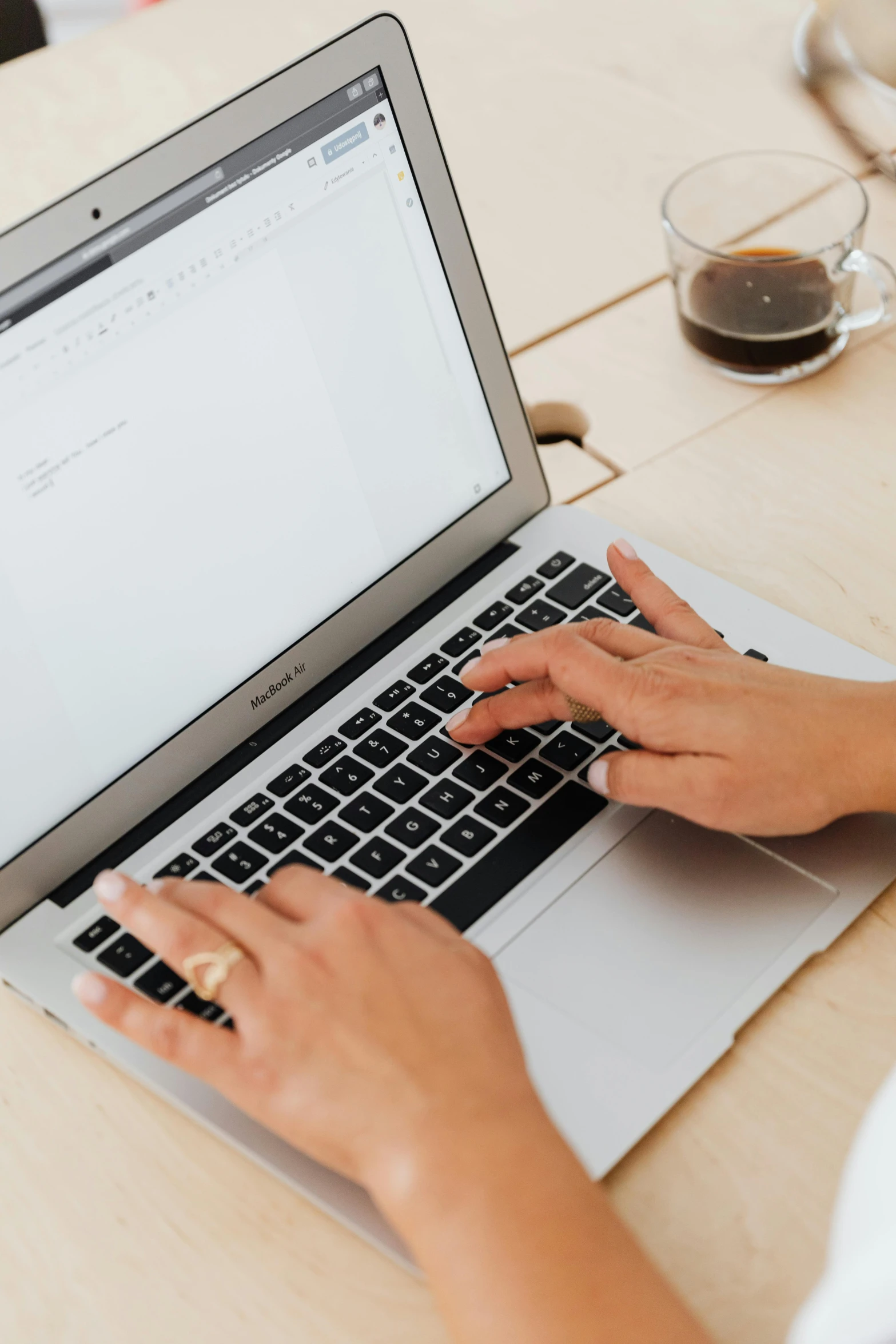 a close up of a person typing on a laptop, by Carey Morris, trending on unsplash, on a white table, avatar image, banner, multiple stories