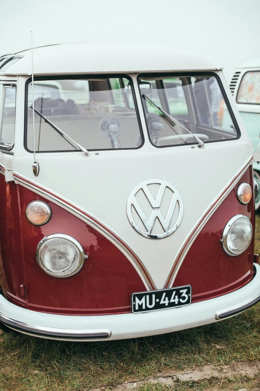 a red and white vw bus parked in a field, brown and white color scheme, instagram picture, medium closeup, new zealand