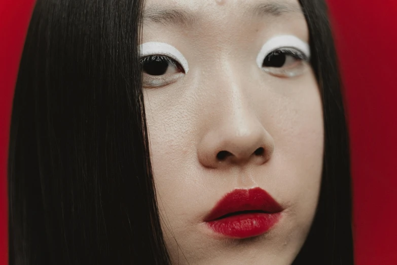 a close up of a woman with red lipstick, inspired by Taro Yamamoto, trending on pexels, surrealism, young cute wan asian face, white prosthetic eyes, square face, jaeyeon nam