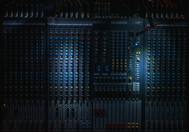 a close up of a sound board in a room, an album cover, inspired by Elsa Bleda, trending on pexels, computer art, nighttime, computer components, panel of black, portrait of a big
