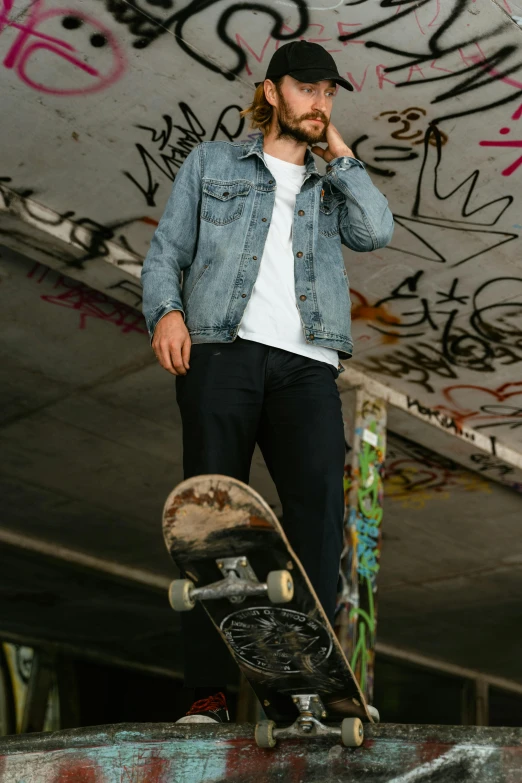 a man talking on a cell phone while standing on a skateboard, a picture, by Niko Henrichon, jean jacket, promo image, structure : kyle lambert, 15081959 21121991 01012000 4k