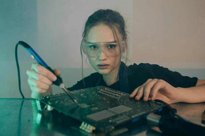 a close up of a person working on a computer, inspired by Elsa Bleda, hardware, teenage girl, portrait n - 9, tech demo