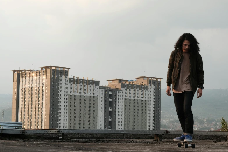 a man riding a skateboard on top of a roof, inspired by Rudy Siswanto, pexels contest winner, realism, dystopian city apartment, tall thin build, cinematic outfit photo, panoramic view of girl