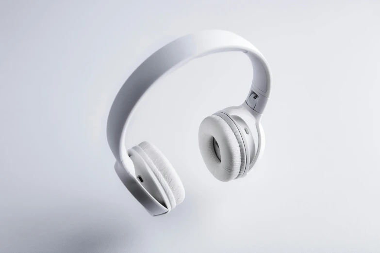 a pair of headphones floating in the air, trending on pexels, hurufiyya, full lenght view. white plastic, thumbnail, glossy white metal, no - text no - logo