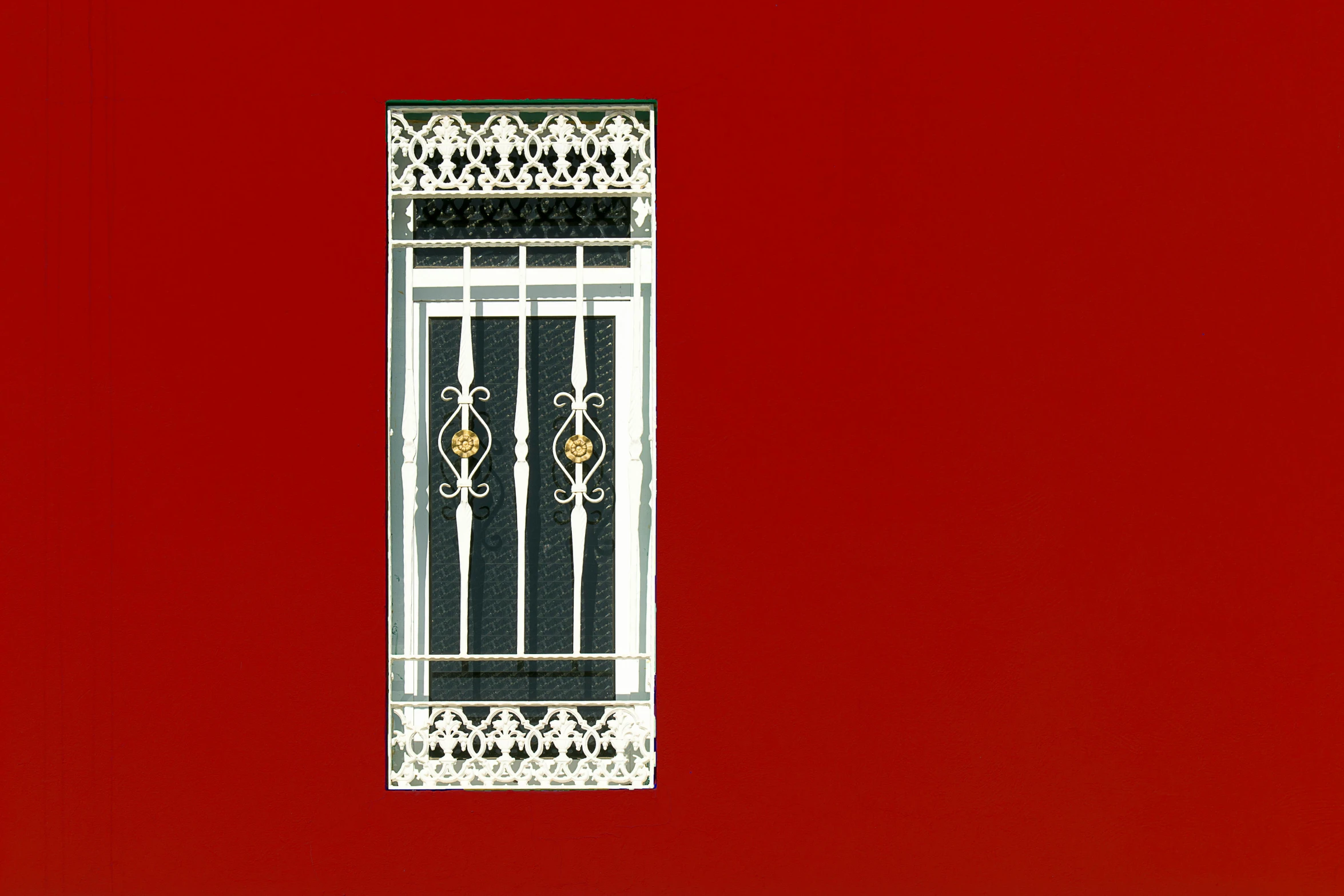 a window on the side of a red building, a digital rendering, inspired by Osman Hamdi Bey, flickr, minimalism, silver filigree, red gold black, behind bars, heavy-gauge filigree