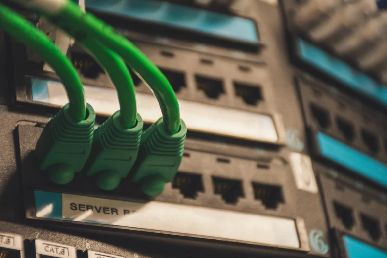 a bunch of green ethernet cables plugged into a server, ilm and digital domain, instagram post, control panel, istock