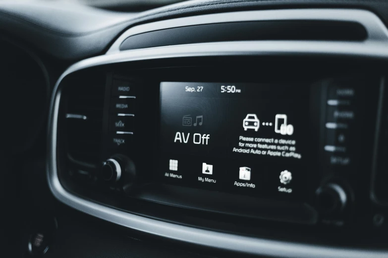 an image of a car stereo screen with a car key