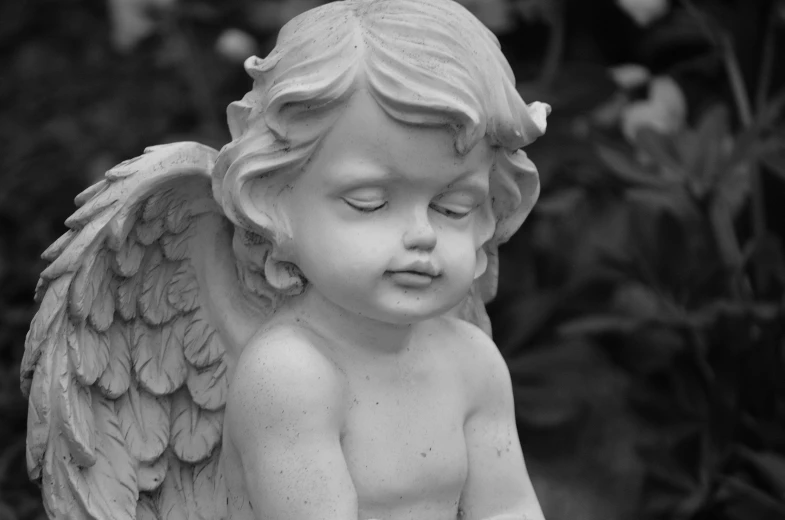 a black and white photo of a little angel, a statue, pixabay contest winner, sleepy expression, biblically acurate angel, relaxing, innocent look