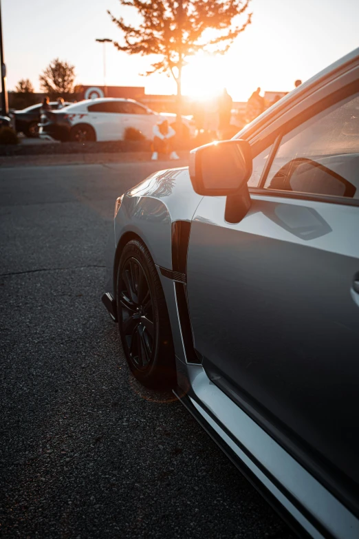 a close up of the side view mirror of a sports car